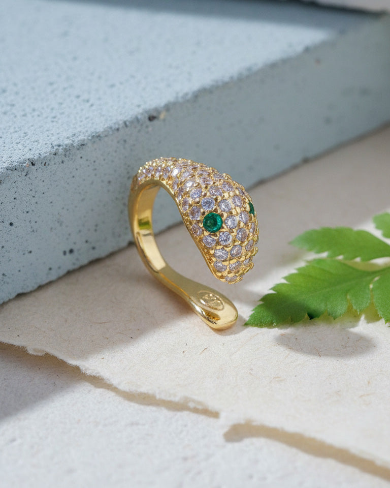 snake earcuff with emerald eyes.