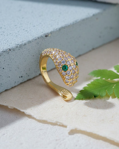 snake earcuff with emerald eyes.