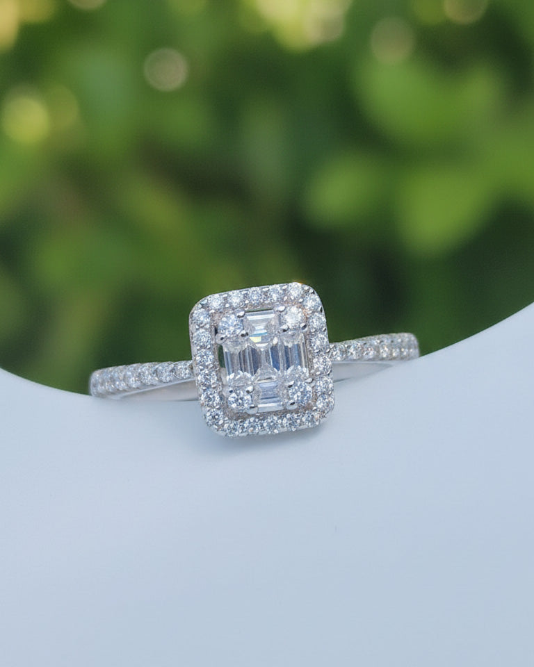 rectangular baguette and round stones ring.