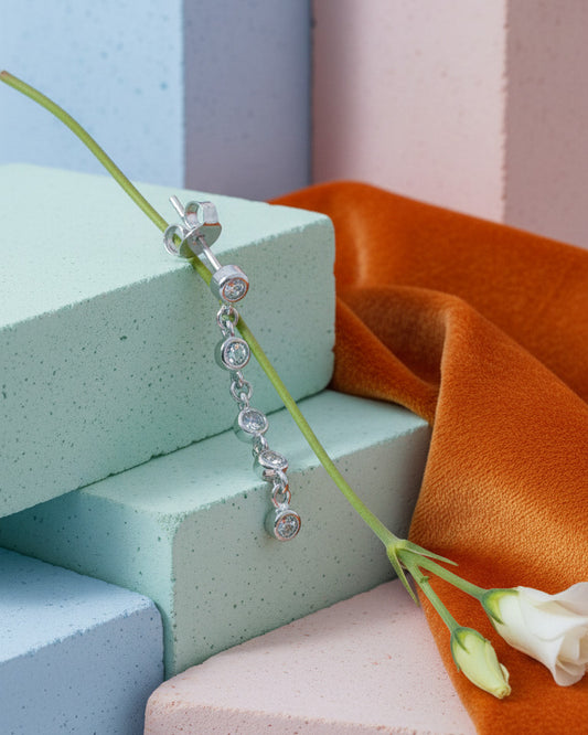 Round CZ in bezel setting dangling links stud earring.