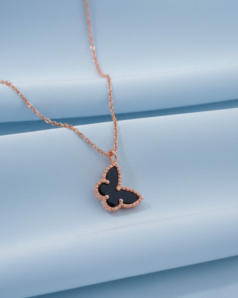 mother of pearl and agate butterfly rosegold necklace.