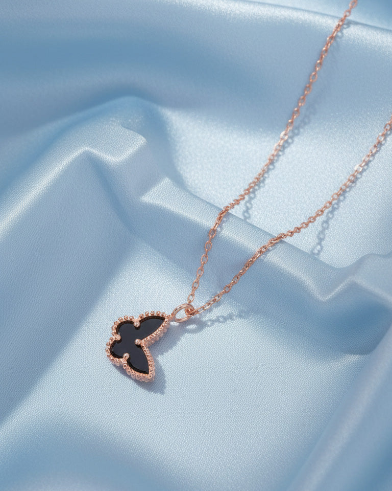 mother of pearl and agate butterfly rosegold necklace.