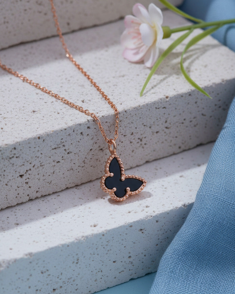 mother of pearl and agate butterfly rosegold necklace.