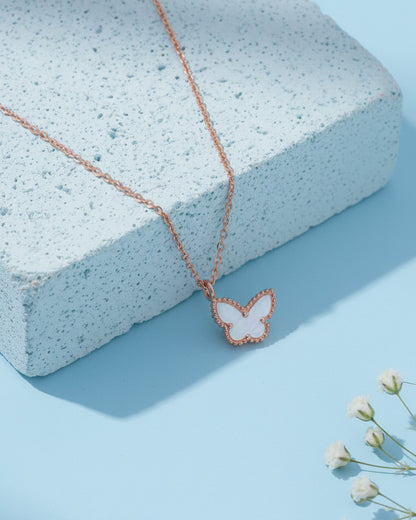 mother of pearl and agate butterfly rosegold necklace.