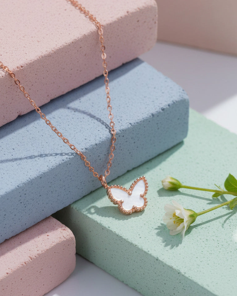 mother of pearl and agate butterfly rosegold necklace.