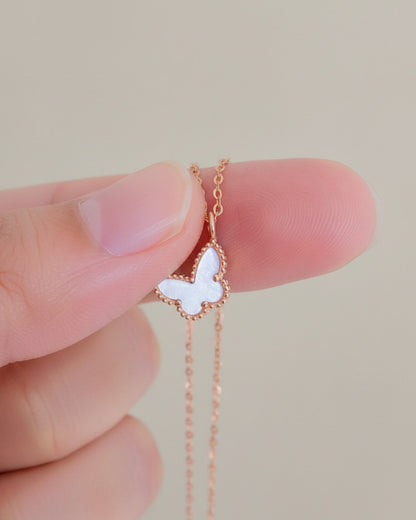 mother of pearl and agate butterfly rosegold necklace.