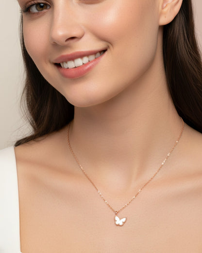mother of pearl and agate butterfly rosegold necklace.