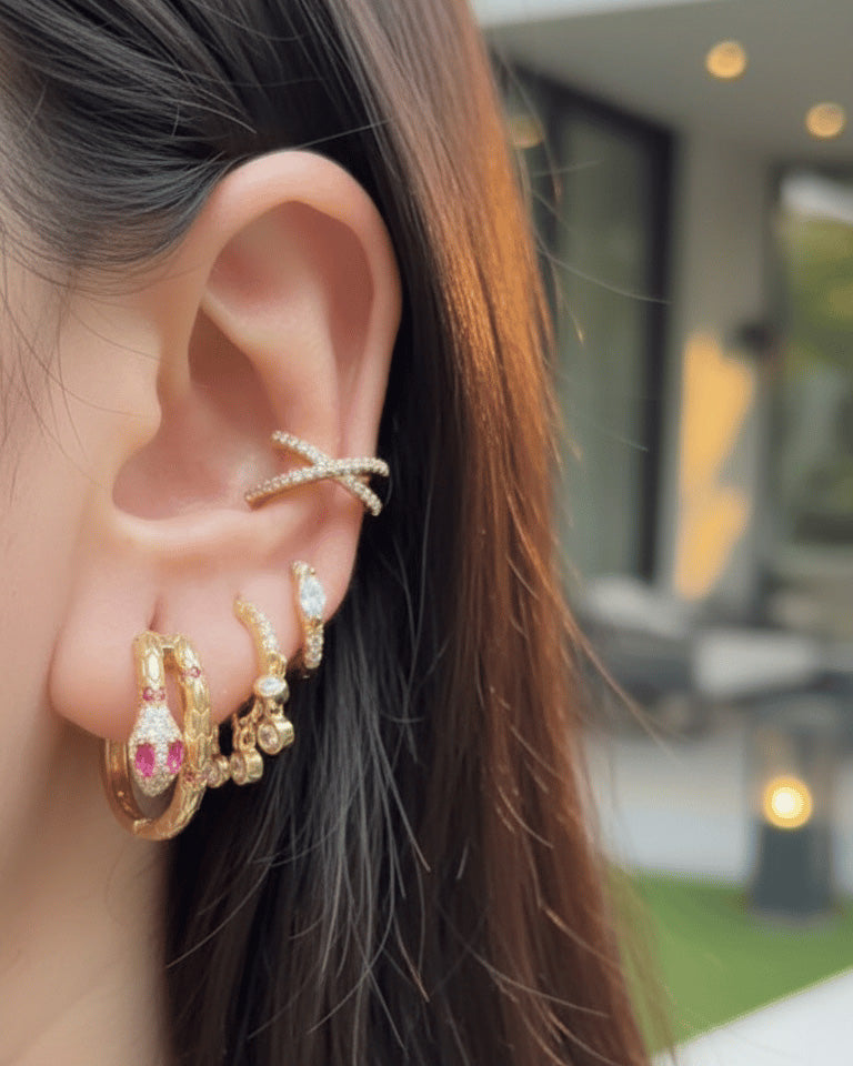 serpent shape hoops earring with ruby CZ.