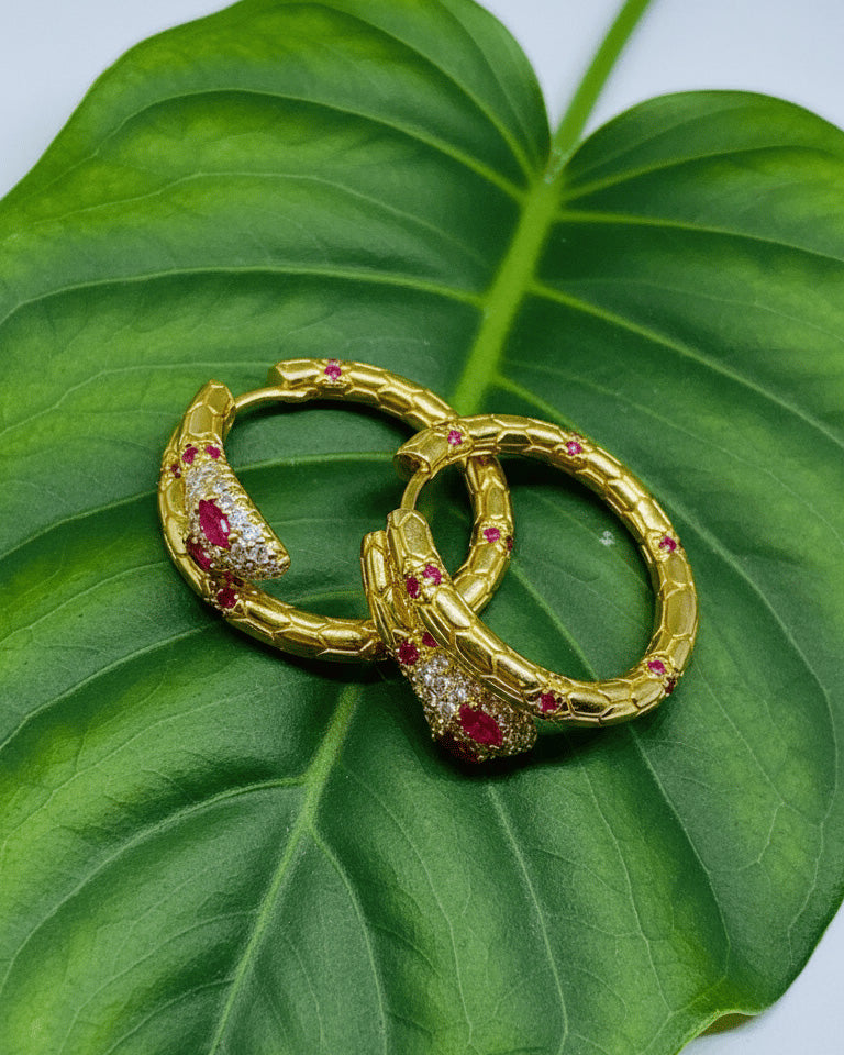 serpent shape hoops earring with ruby CZ.