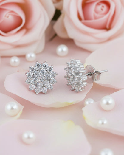 Cluster of round shape CZ in a flower shape stud earring.