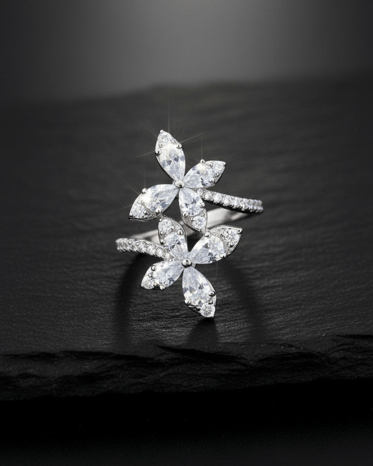 double butterfly of round and pear shapes CZ stones ring.