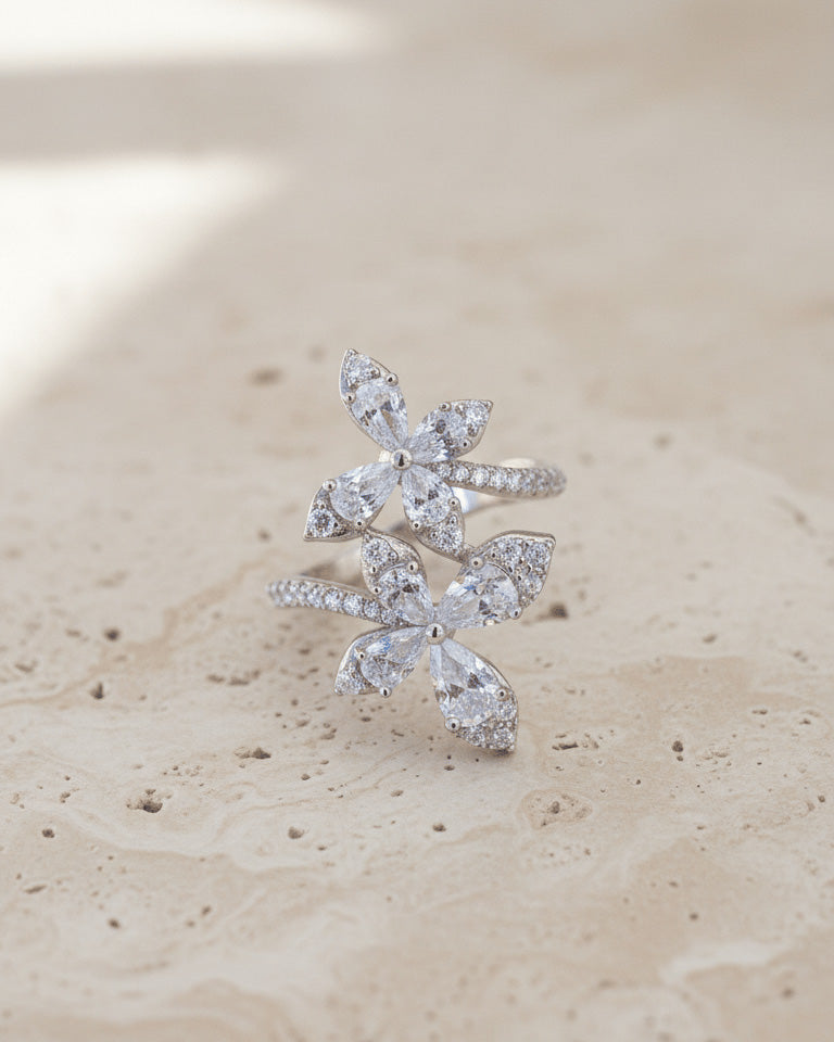 double butterfly of round and pear shapes CZ stones ring.