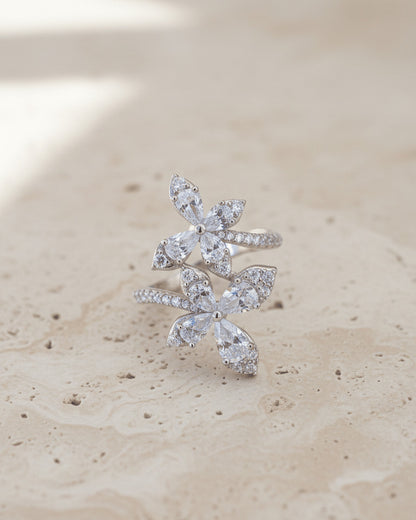 double butterfly of round and pear shapes CZ stones ring.