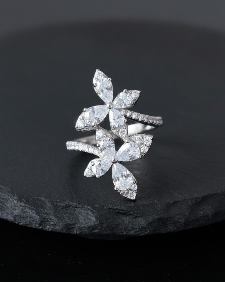 double butterfly of round and pear shapes CZ stones ring.