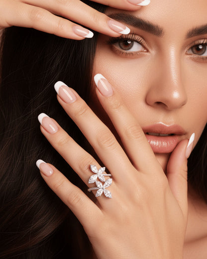 double butterfly of round and pear shapes CZ stones ring.