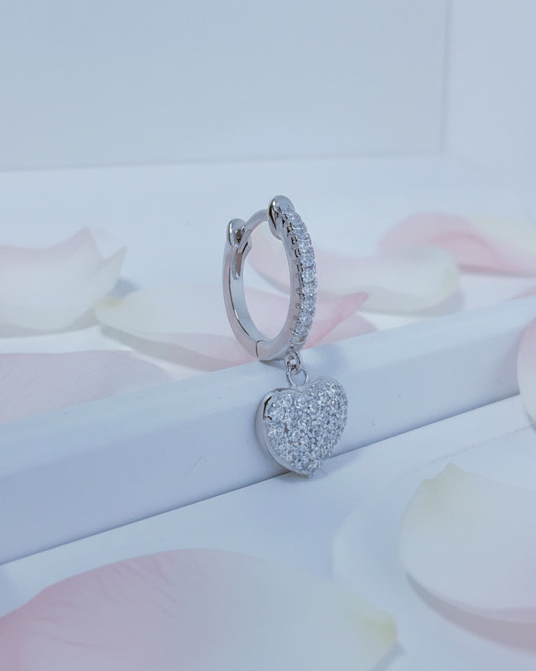CZ huggie hoop with dangling heart shape.