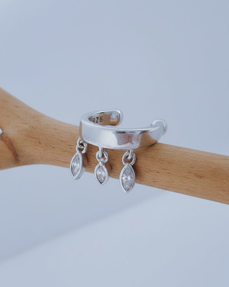 plain earcuff with dangling CZ marquise shapes in bezel setting.
