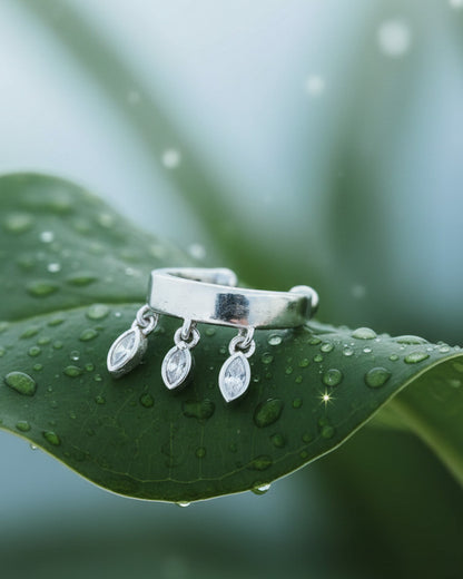 plain earcuff with dangling CZ marquise shapes in bezel setting.