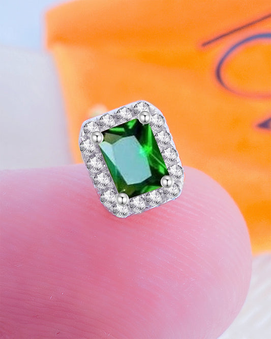 CZ emerald color rectangular stone in a halo setting stud earring.