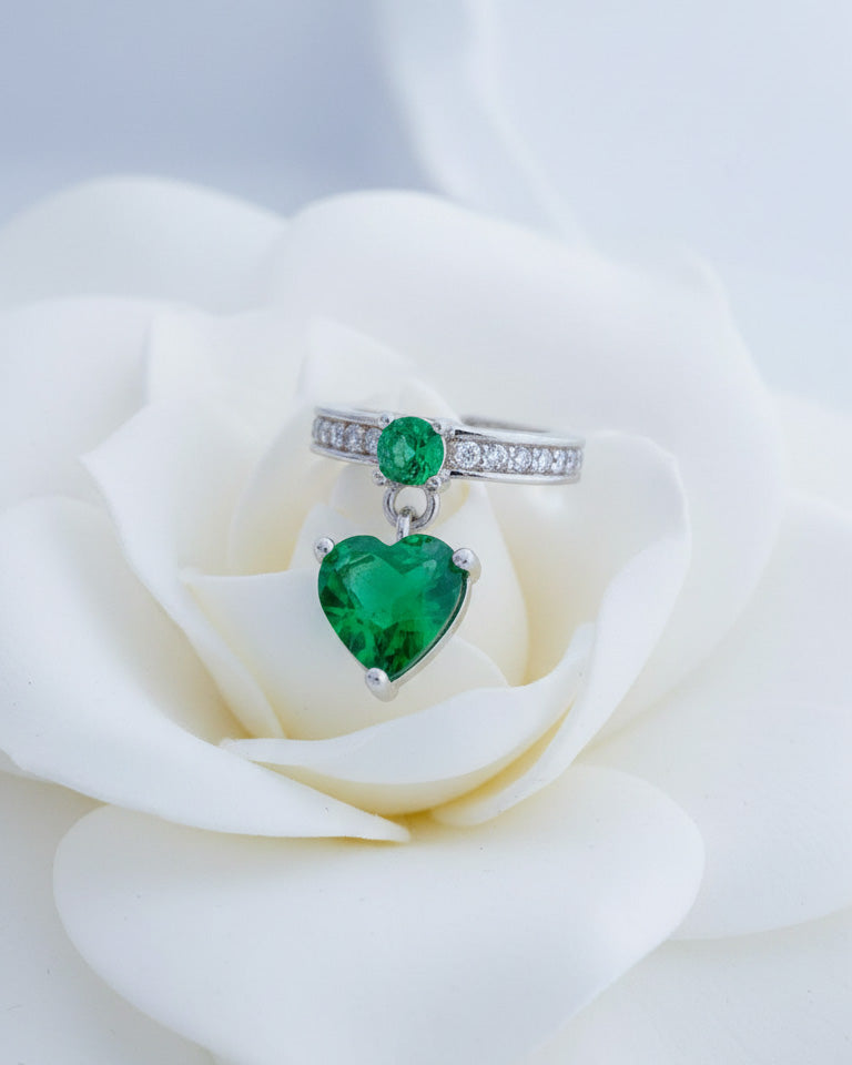 CZ ear-cuff with dangling emerald color heart shape stone.
