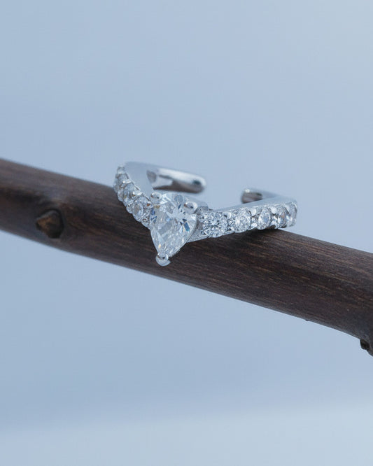 simple CZ ear-cuff with a center pear shape stone.