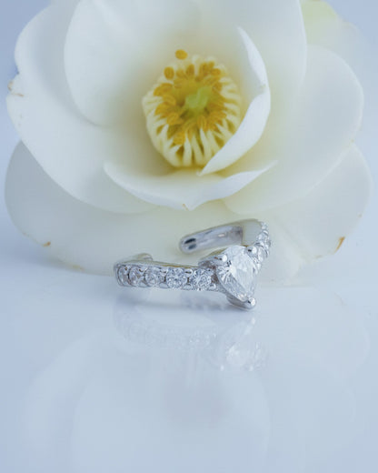 simple CZ ear-cuff with a center pear shape stone.