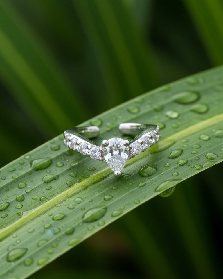 simple CZ ear-cuff with a center pear shape stone.