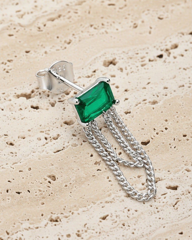 emerald color stud earring with double dangling chain.