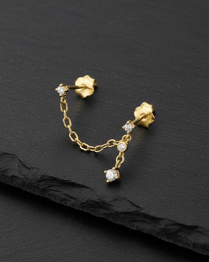 minimal double stud chain earring with dangling chain of two stones.