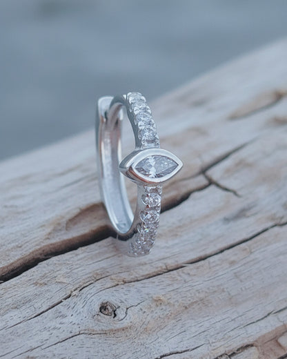9mm CZ huggie hoop with a horizontal marquise stone.
