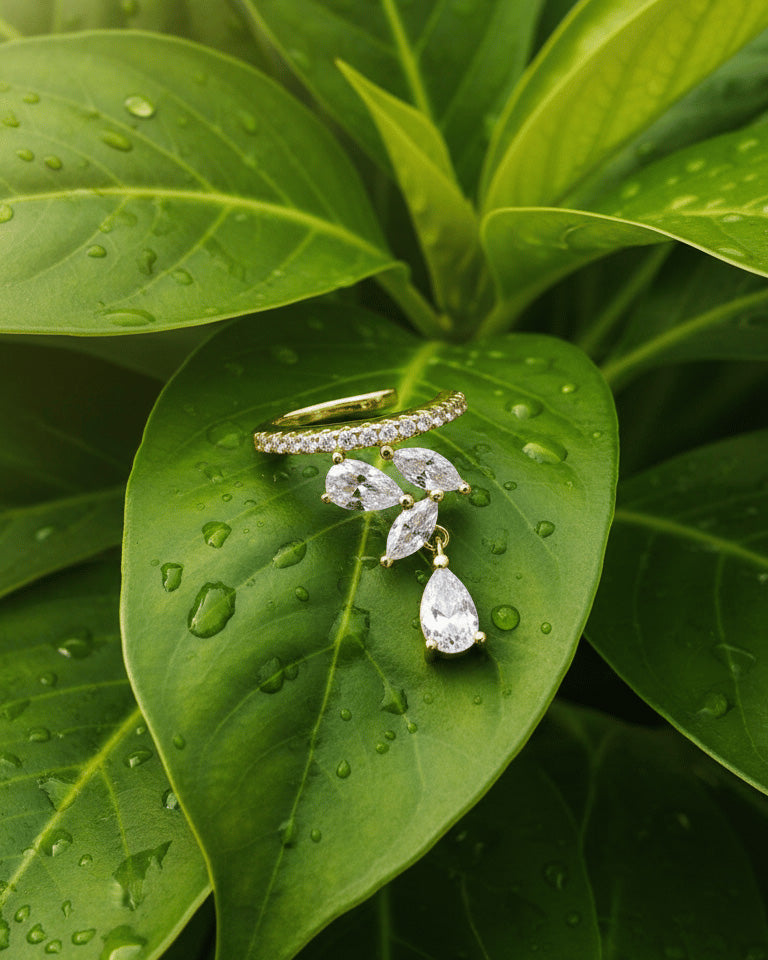 One line CZ with marquise and pear stones earcuff.