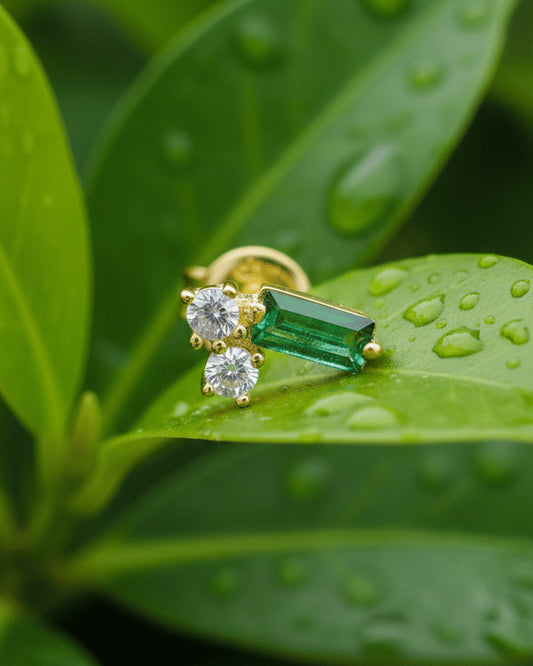 emerald baguette and two white stone stud earring.