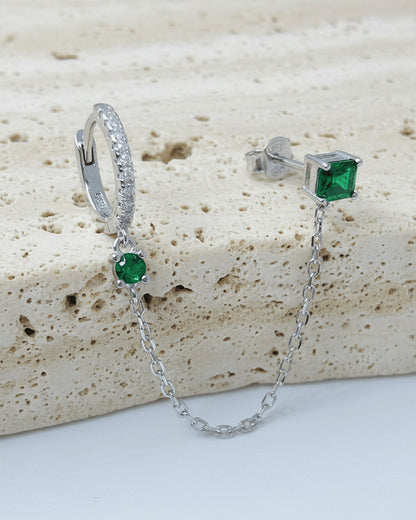 chain linked hoop and rectangular emerald color stone stud earring.