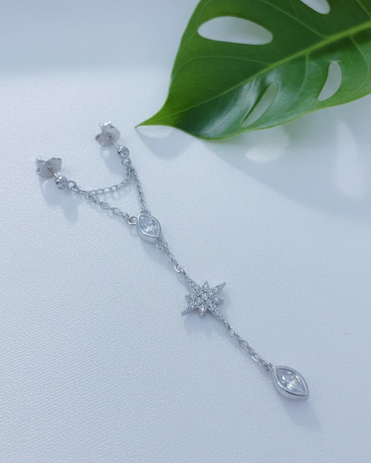 double stud dangling earring with star shape and marquise stones in bezel setting.
