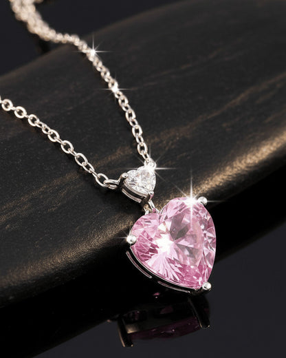 pink heart necklace.