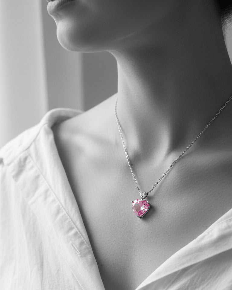 pink heart necklace.