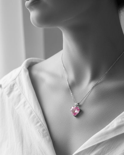 pink heart necklace.