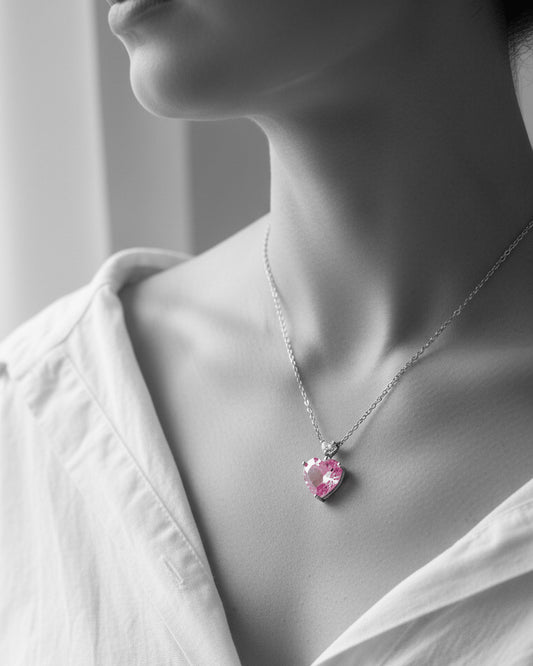 pink heart necklace.