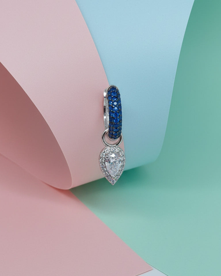deep blue CZ hoop with a dangling with pear shape.
