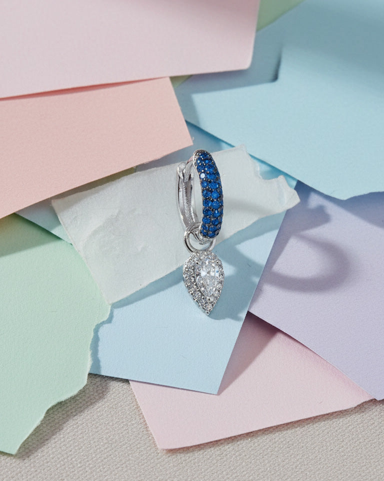 deep blue CZ hoop with a dangling with pear shape.