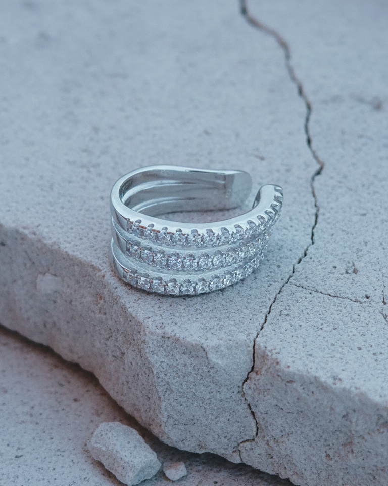 Thee lines of white CZ ear-cuff.