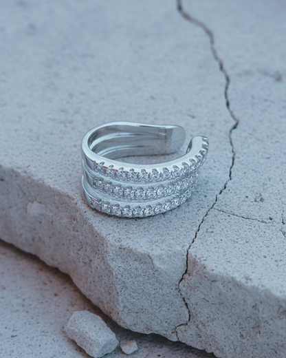 Thee lines of white CZ ear-cuff.