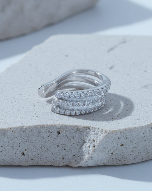 Thee lines of white CZ ear-cuff.