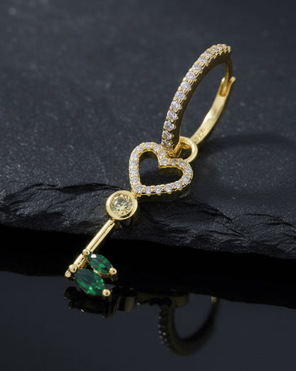 heart key shape dangling huggie hoop earring.