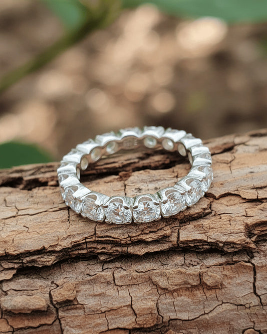 all round eternity ring of round stones.