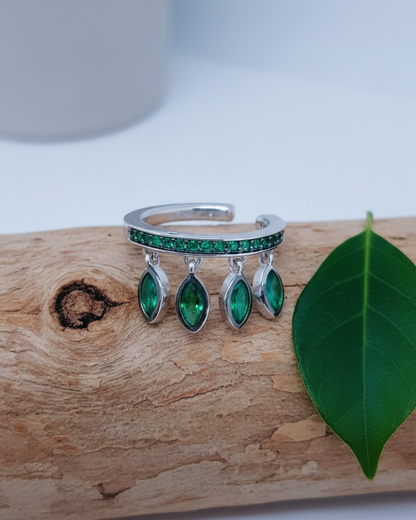 emerald color CZ with dangling marquise shapes.