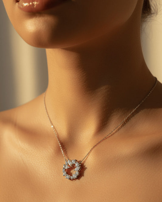 sterling silver circle of love necklace of round and fancy CZ stones.