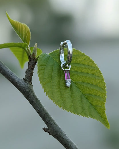 9 mm plain huggie hoops with removable dangling with pink baguette stone.