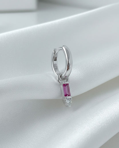 9 mm plain huggie hoops with removable dangling with pink baguette stone.