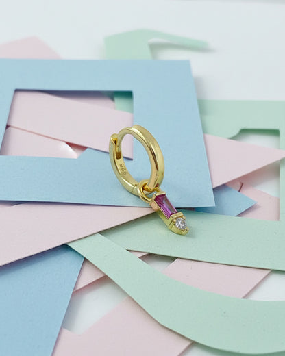 9 mm plain huggie hoops with removable dangling with pink baguette stone.